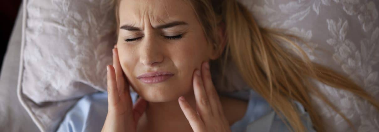 Jaw pain after waking up or sleeping, TMJ Bruxisum, teeth grinding